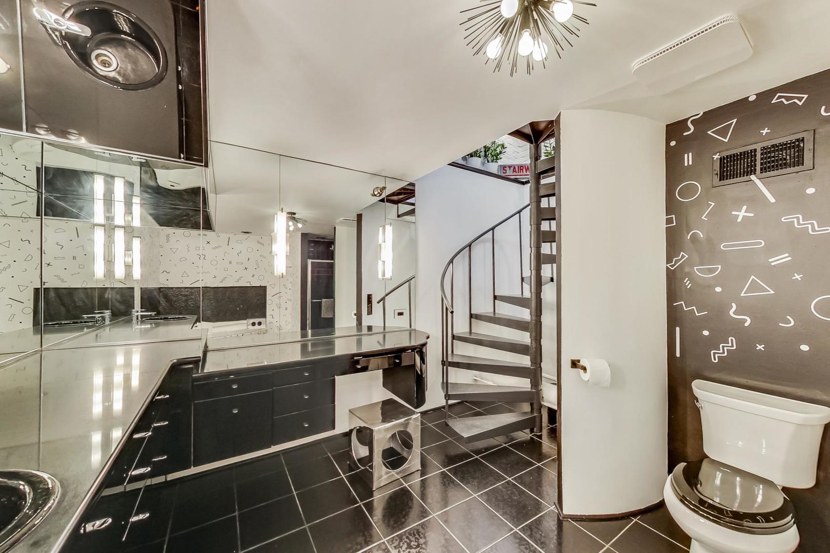 1147 West Ohio Street, Unit 201 Chicago, IL 60642 - Photo 45 of 54 a view of an entryway with seating