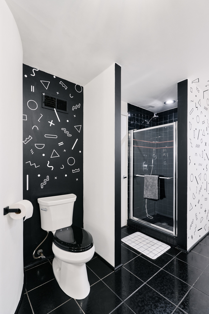 1147 West Ohio Street, Unit 201 Chicago, IL 60642 - Photo 47 of 54 a bathroom with a toilet and a shower