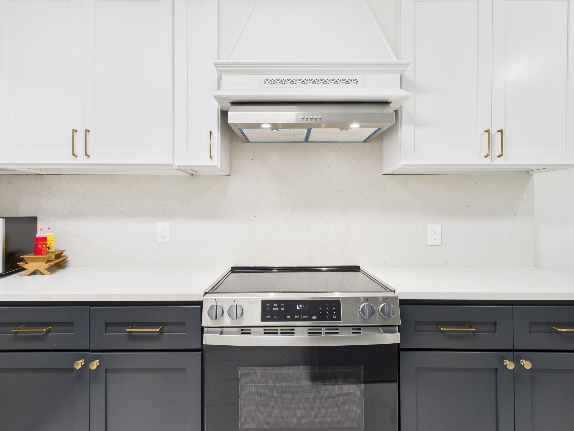 7836 Bateman Lane, Unit 7836 Houston, TX 77088 - Photo 14 of 44 a stove top oven sitting inside of a kitchen
