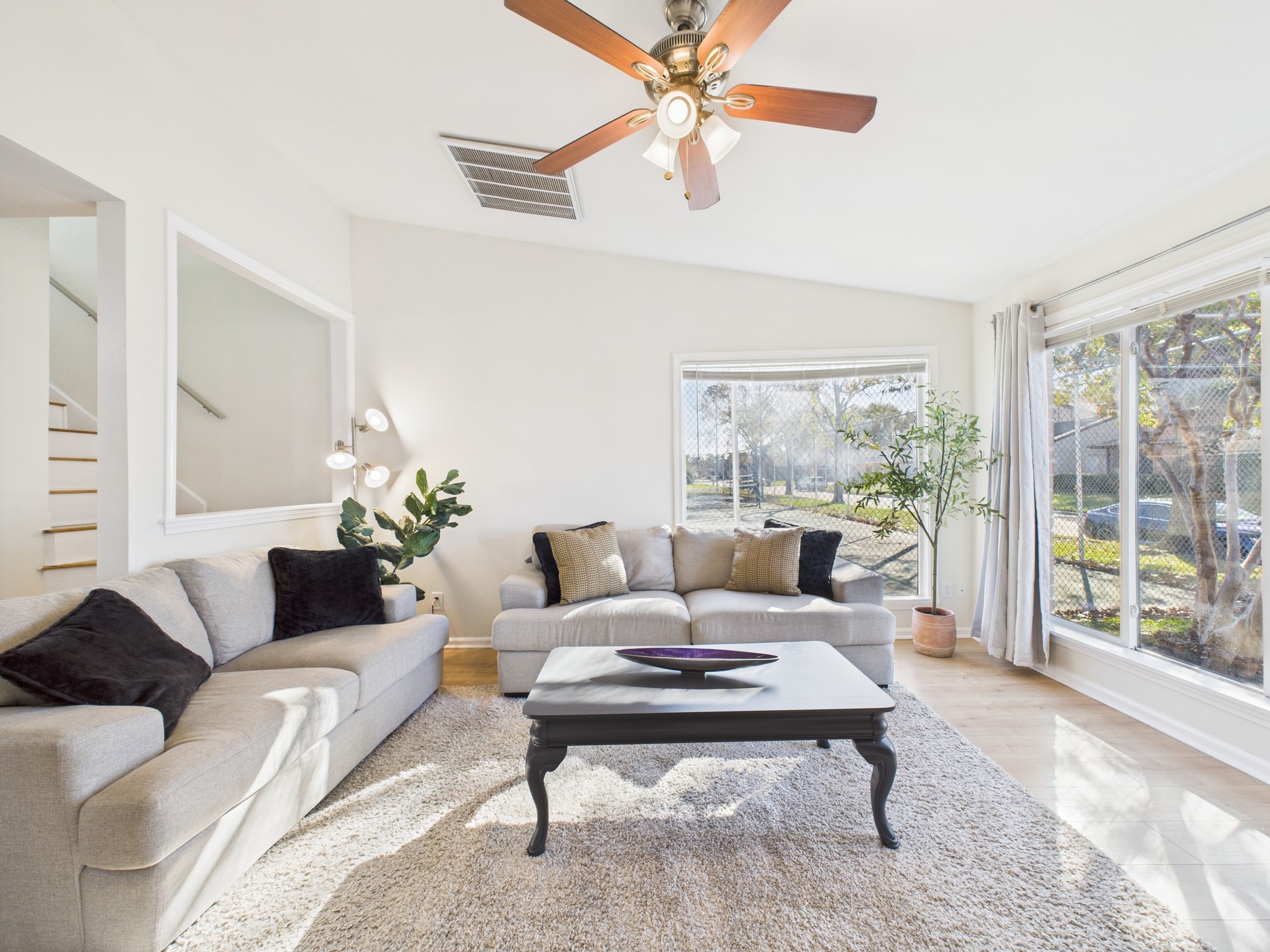 7836 Bateman Lane, Unit 7836 Houston, TX 77088 - Photo 2 of 44 a living room with furniture and a large window