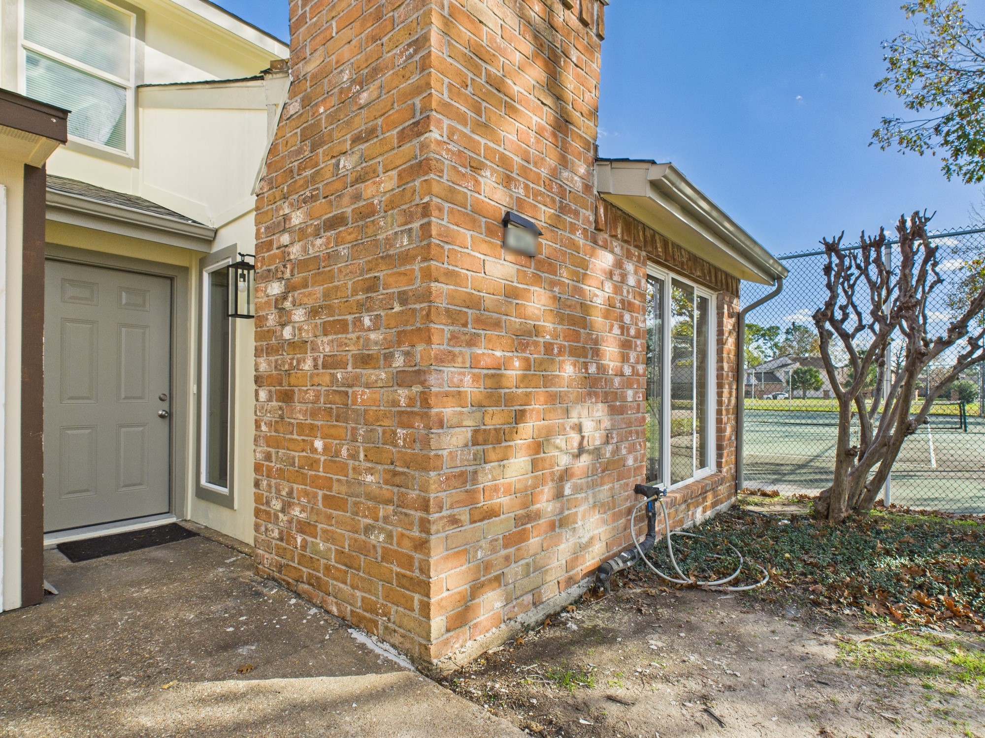 7836 Bateman Lane, Unit 7836 Houston, TX 77088 - Photo 43 of 44 a backyard of a house