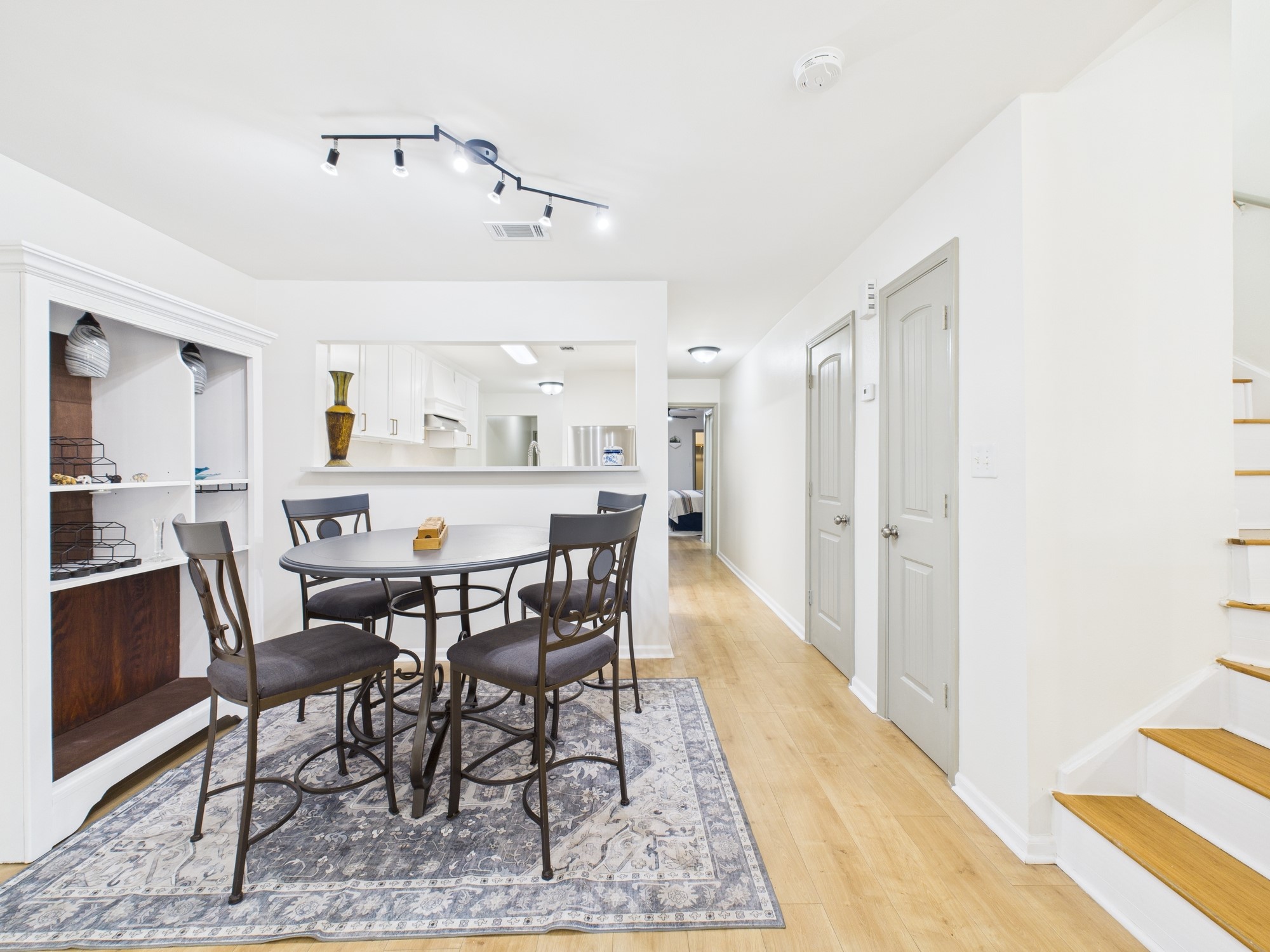 7836 Bateman Lane, Unit 7836 Houston, TX 77088 - Photo 8 of 44 a view of a dining room with furniture