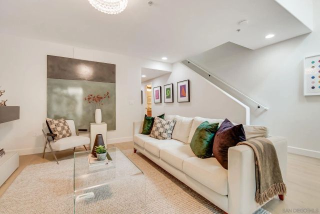 a living room with furniture and a couch