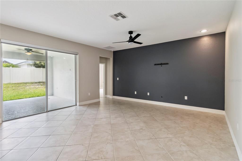 2066 Cresswell Street Ocoee, FL 34761 - Photo 12 of 32 an empty room with a empty space and windows