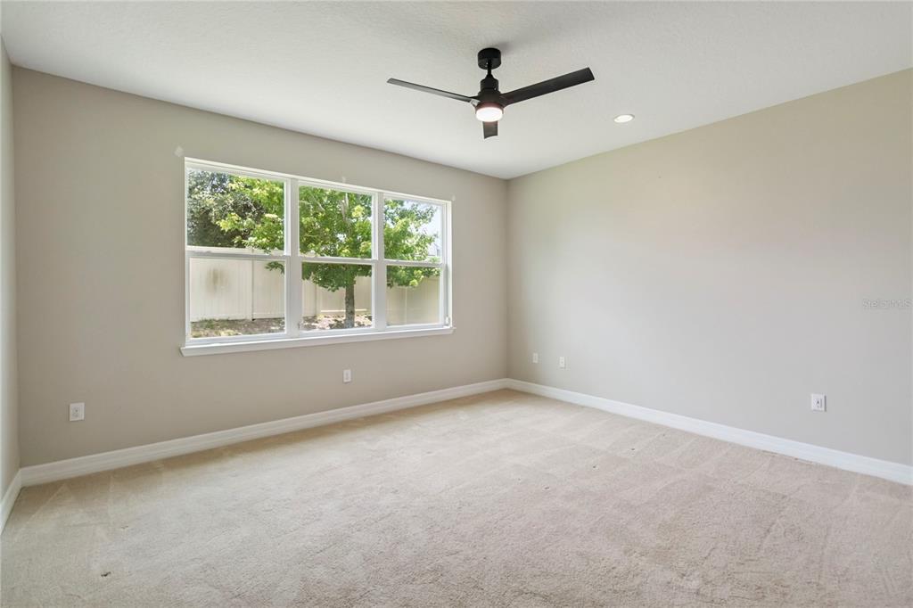 2066 Cresswell Street Ocoee, FL 34761 - Photo 14 of 32 a view of an empty room with a window