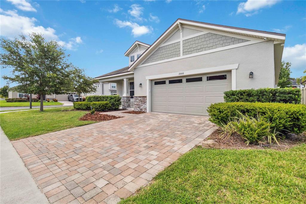 2066 Cresswell Street Ocoee, FL 34761 - Photo 2 of 32 a view of a yard in front view of a house