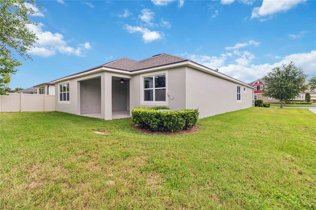 2066 Cresswell Street Ocoee, FL 34761 - Photo 24 of 32 a view of a house with a yard