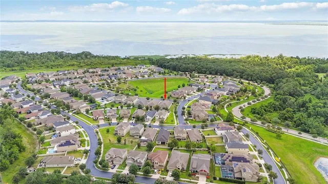 an empty room with a bathroom and a sink