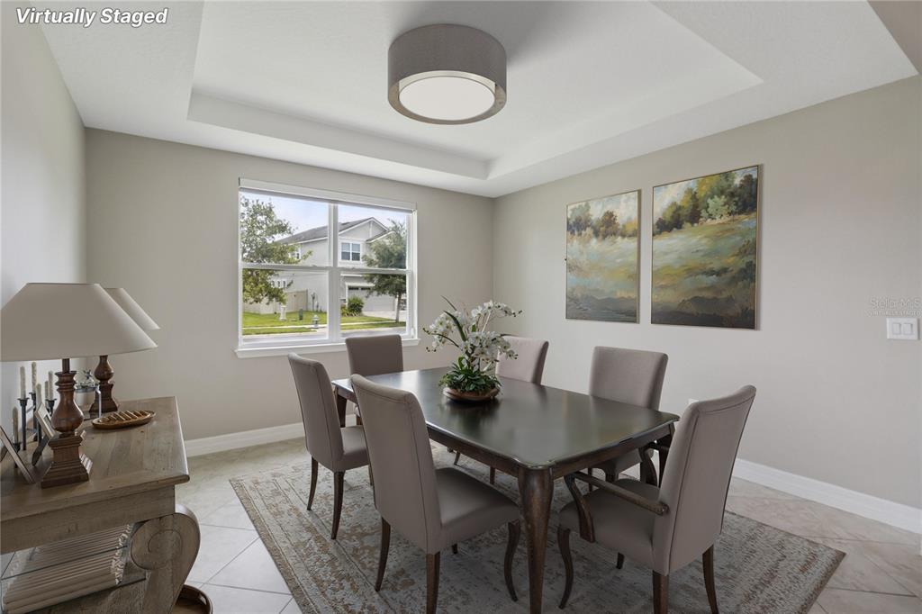 2066 Cresswell Street Ocoee, FL 34761 - Photo 5 of 32 a view of a dining room with furniture window and outside view