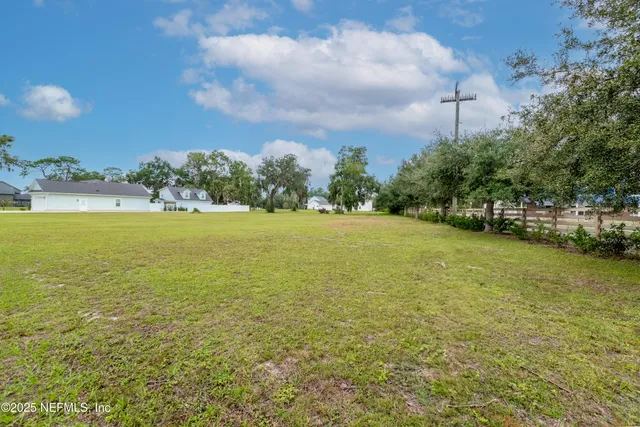 a view of a balcony with chairs and a table