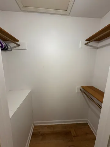 a view of a room with racks on the wall