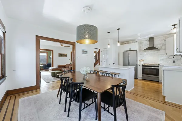 a bedroom with a bed and a table in it