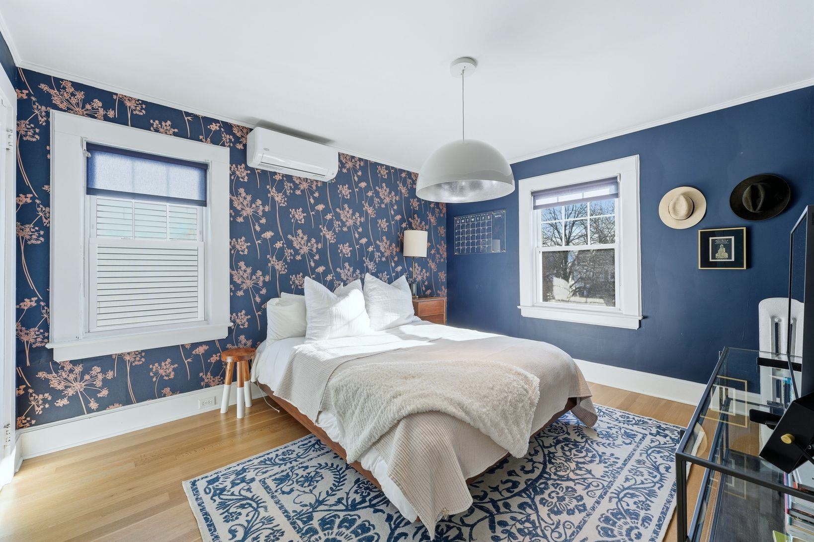 32 Dodd Street Montclair, NJ 07042 - Photo 25 of 36 a bedroom with a bed and a table in it