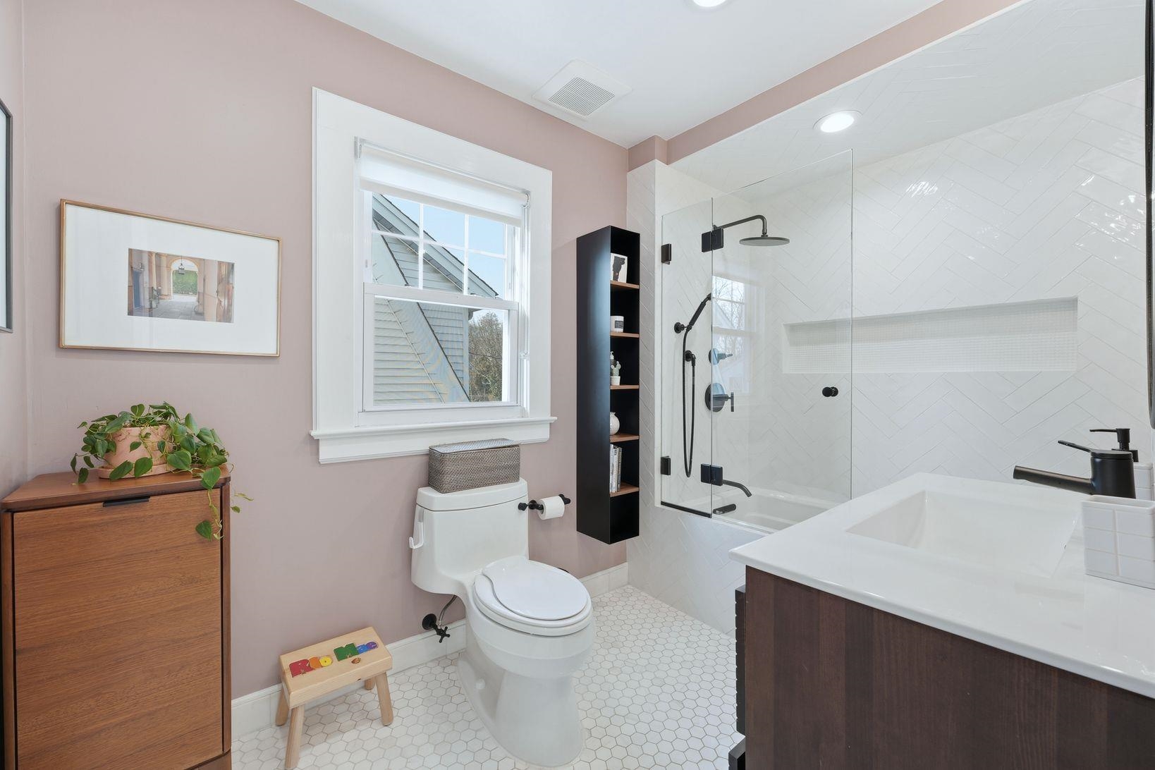 32 Dodd Street Montclair, NJ 07042 - Photo 30 of 36 a bathroom with a sink a toilet and shower