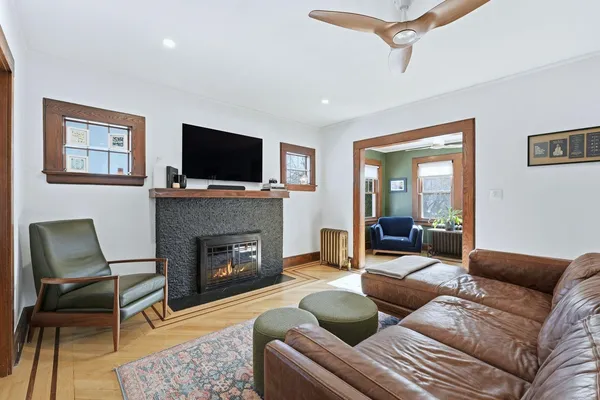 a living room with furniture and a window