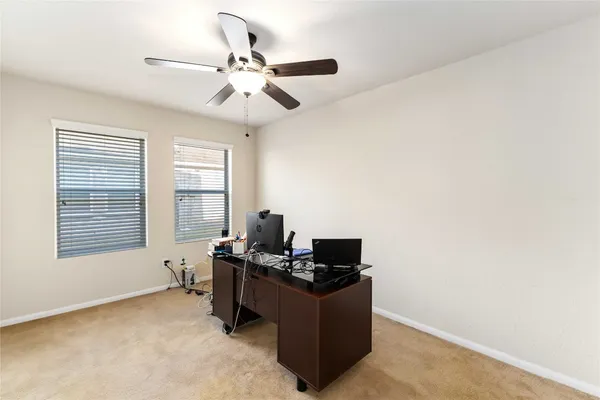 a room with furniture and windows