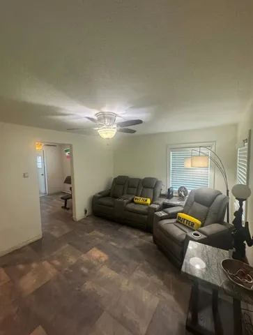 a living room with furniture and a couch