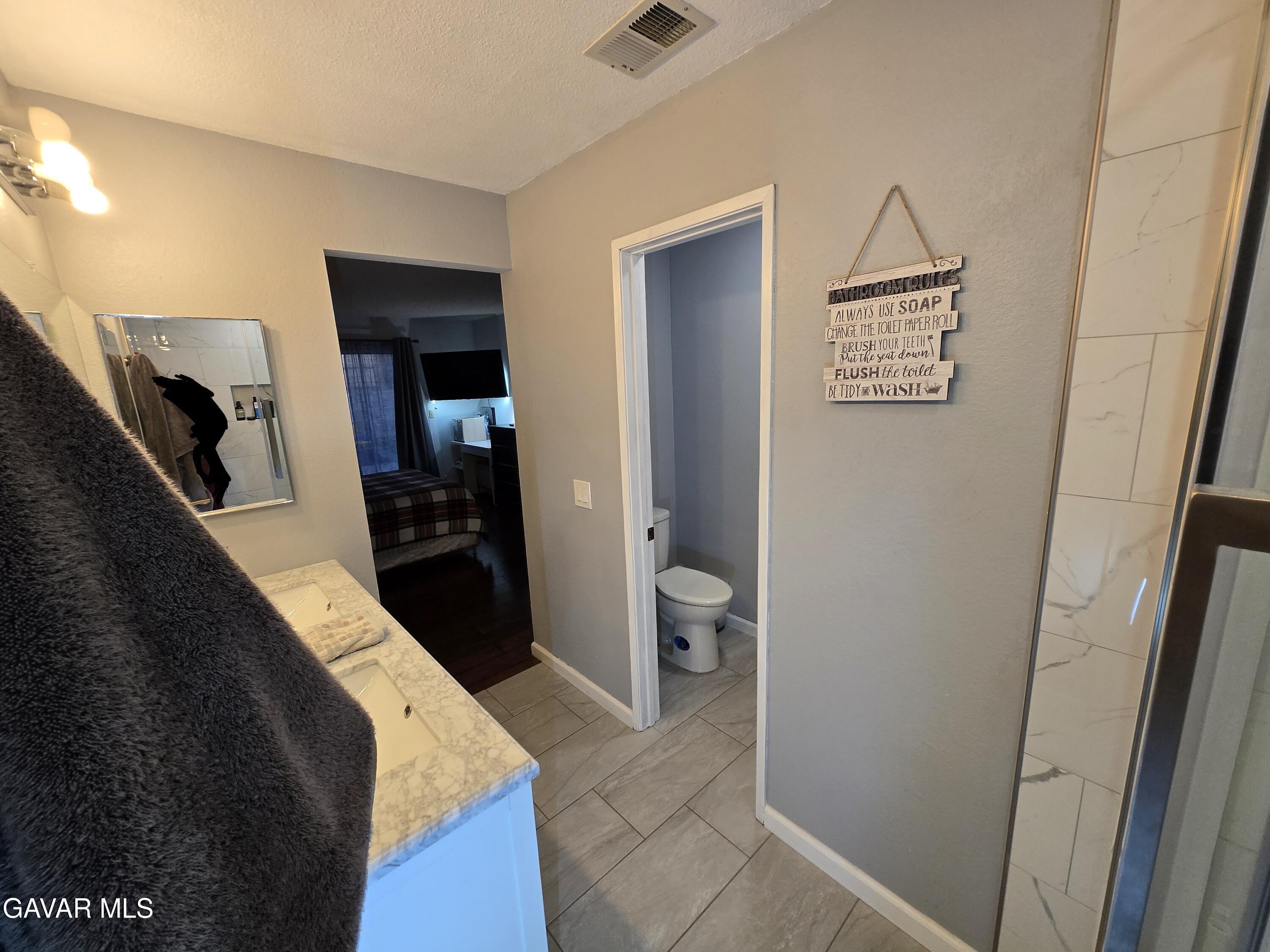 3840 Hatcher Place Rosamond, CA 93560 - Photo 20 of 28 a walk in closet