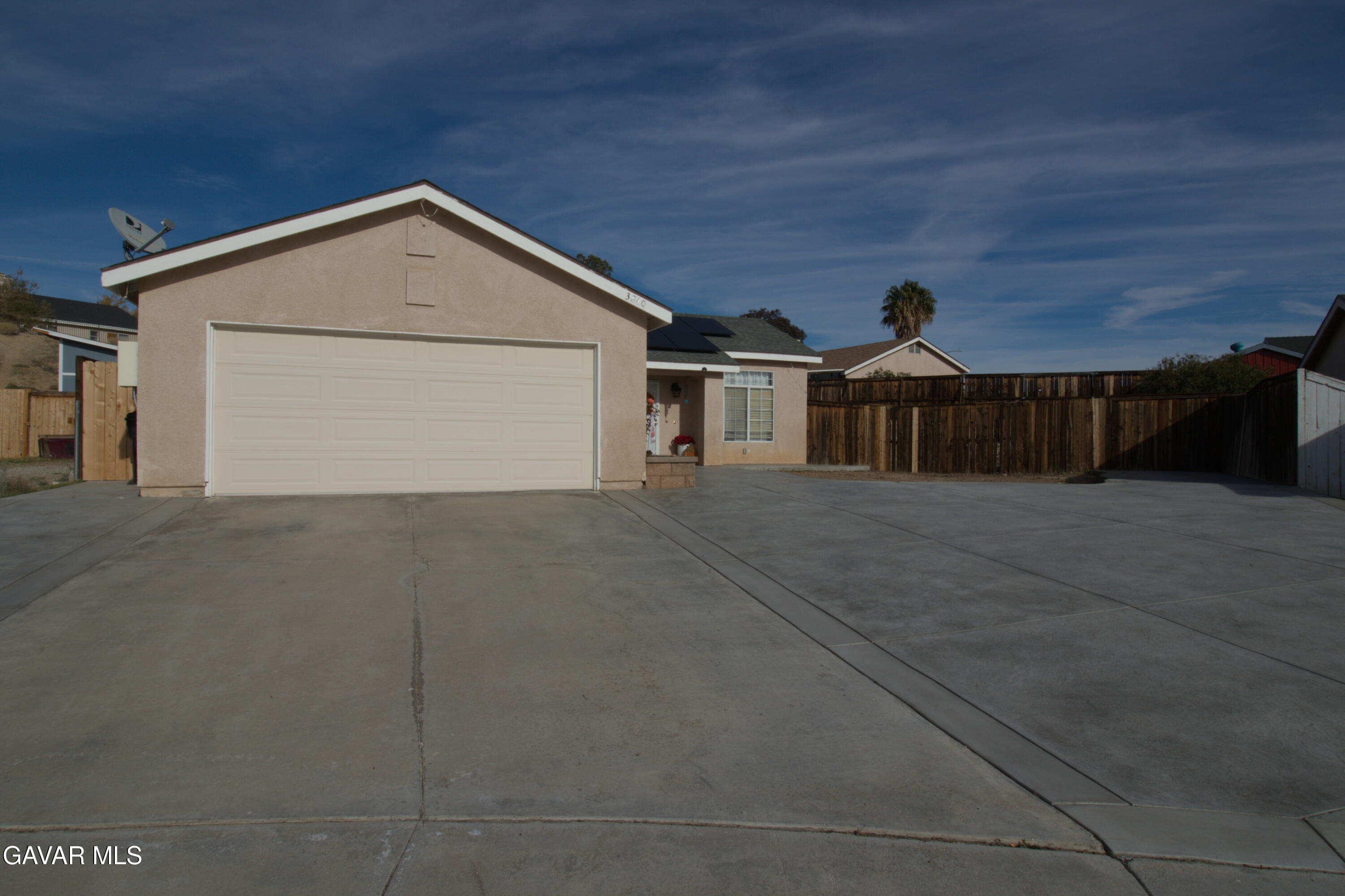 3840 Hatcher Place Rosamond, CA 93560 - Photo 2 of 28 a view of house with garage