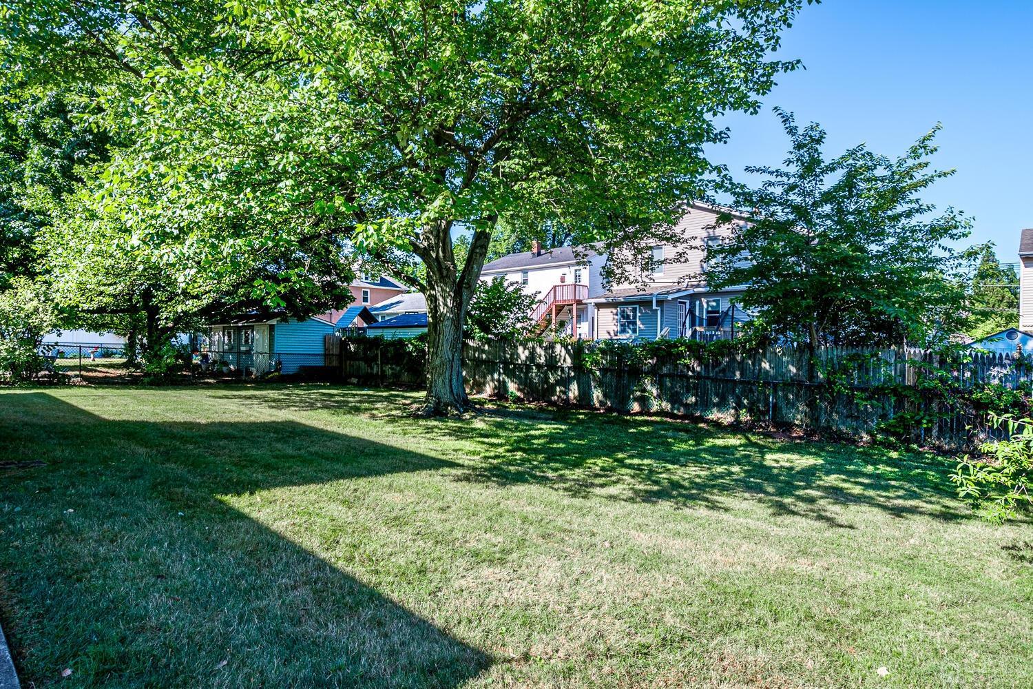 238 Suttons Lane Edison, NJ 08817 - Photo 20 of 21 a view of a house with a yard