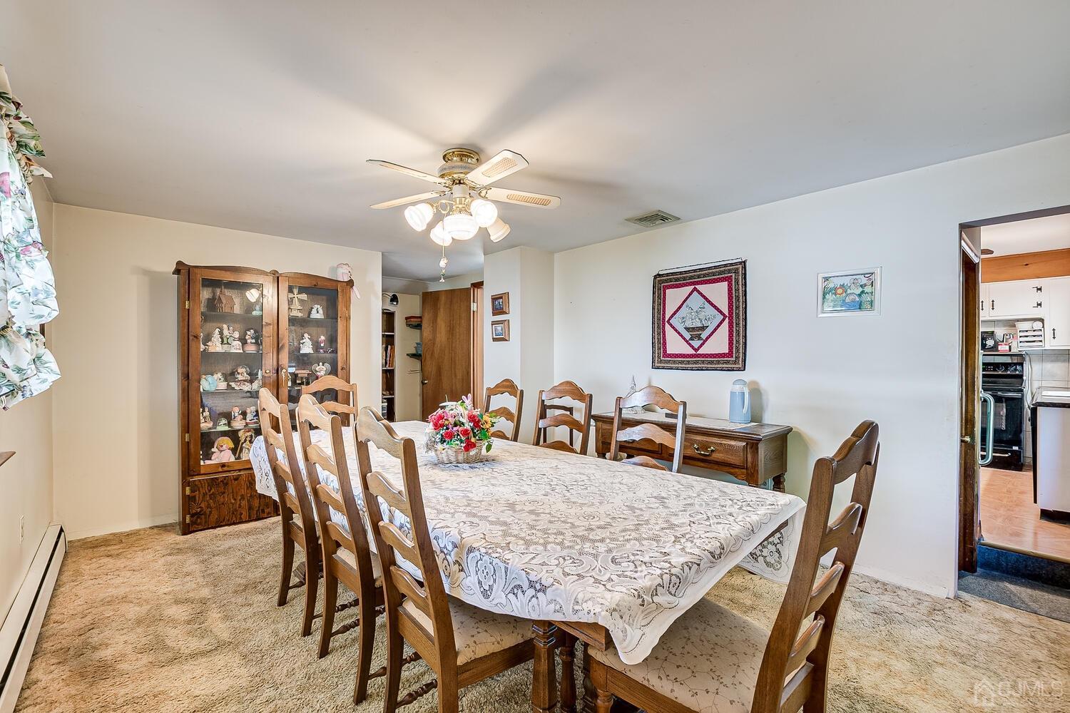 238 Suttons Lane Edison, NJ 08817 - Photo 9 of 21 a view of a dining room with furniture