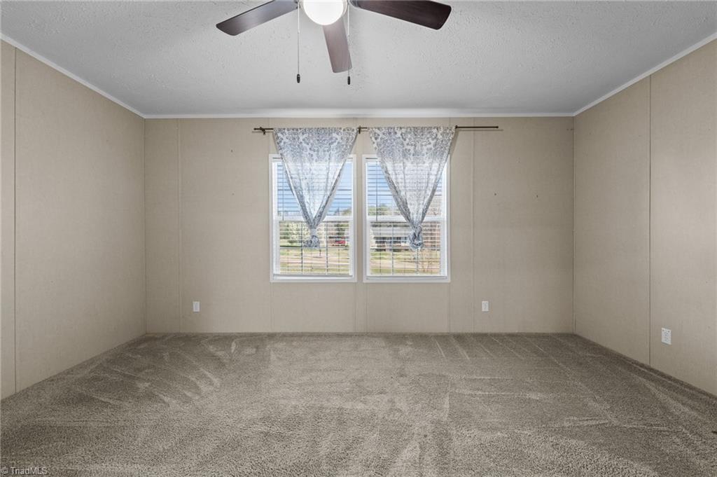 182 Pond View Drive Ruffin, NC 27326 - Photo 20 of 39 Primary Bedroom