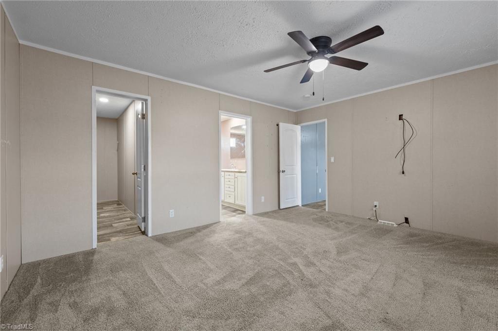 182 Pond View Drive Ruffin, NC 27326 - Photo 21 of 39 Primary Bedroom