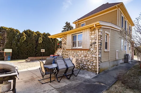 a view of a house with a patio