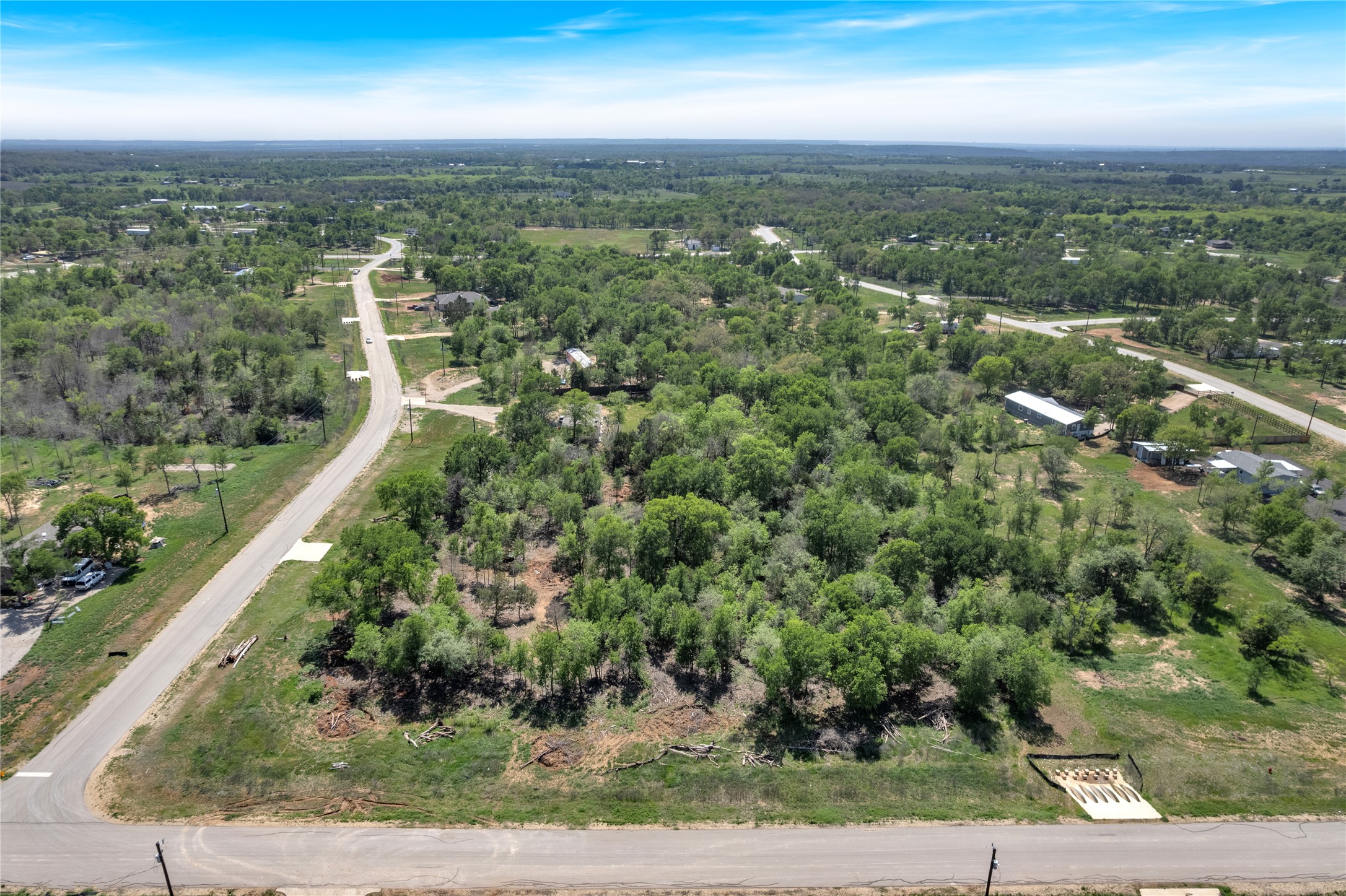 112 Empire Street Elgin, TX 78621 - Photo 14 of 22 Aerial view featuring a view of trees