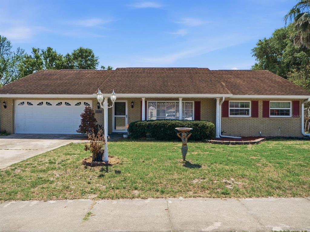 a house view with a garden space