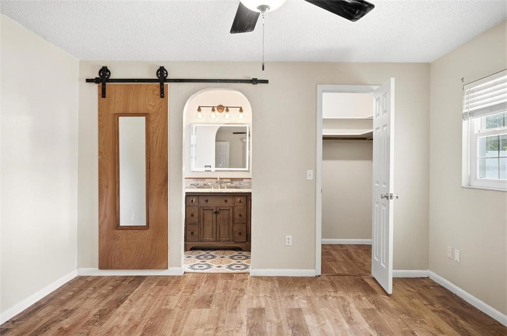 1071 Angora Street Deltona, FL 32725 - Photo 11 of 45 a view of front door with wooden floor