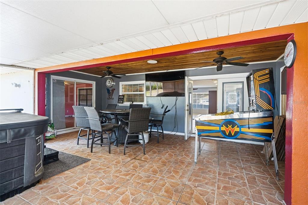 1071 Angora Street Deltona, FL 32725 - Photo 25 of 45 a view of a dining area with furniture and a tub