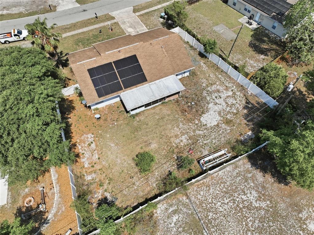 1071 Angora Street Deltona, FL 32725 - Photo 40 of 45 an aerial view of a house with a yard
