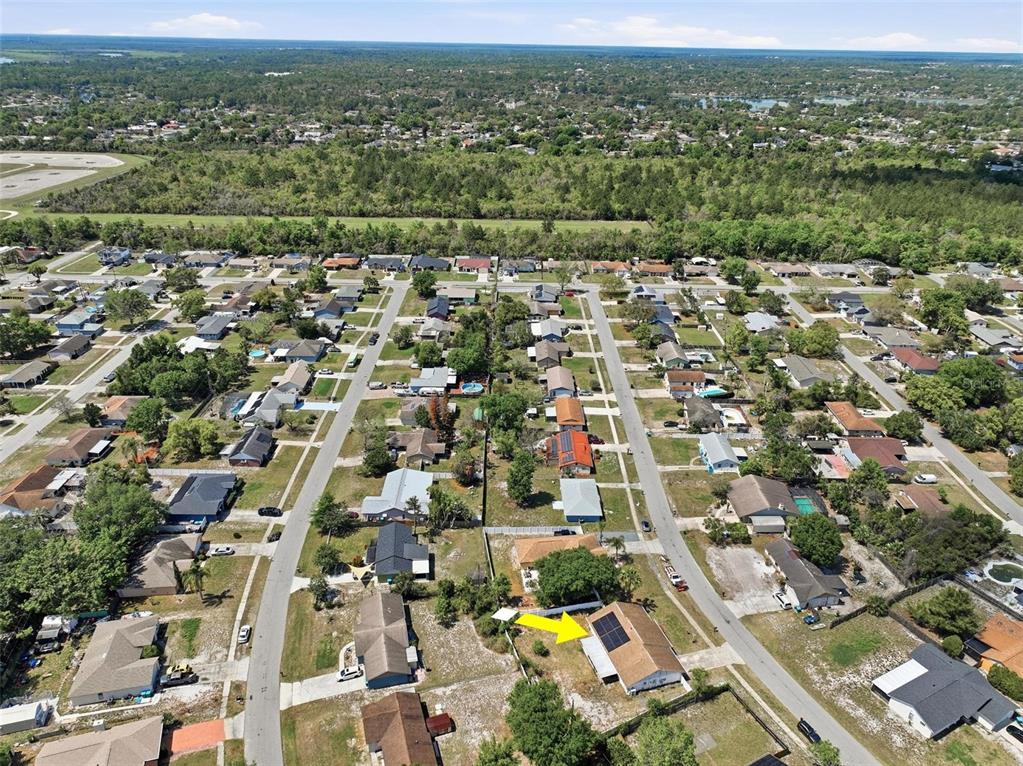 1071 Angora Street Deltona, FL 32725 - Photo 43 of 45 an aerial view of residential houses with outdoor space and view