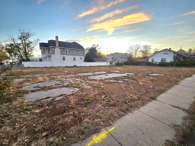a view of ocean with a mountain