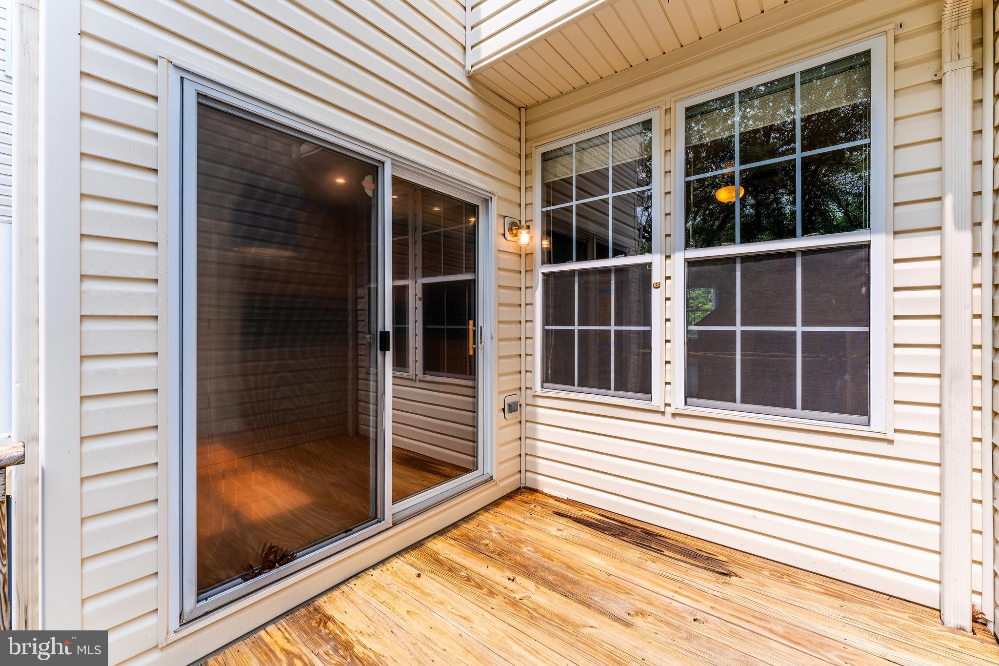 43103 Forest Edge Square Broadlands, VA 20148 - Photo 25 of 57 a view of a balcony with front door