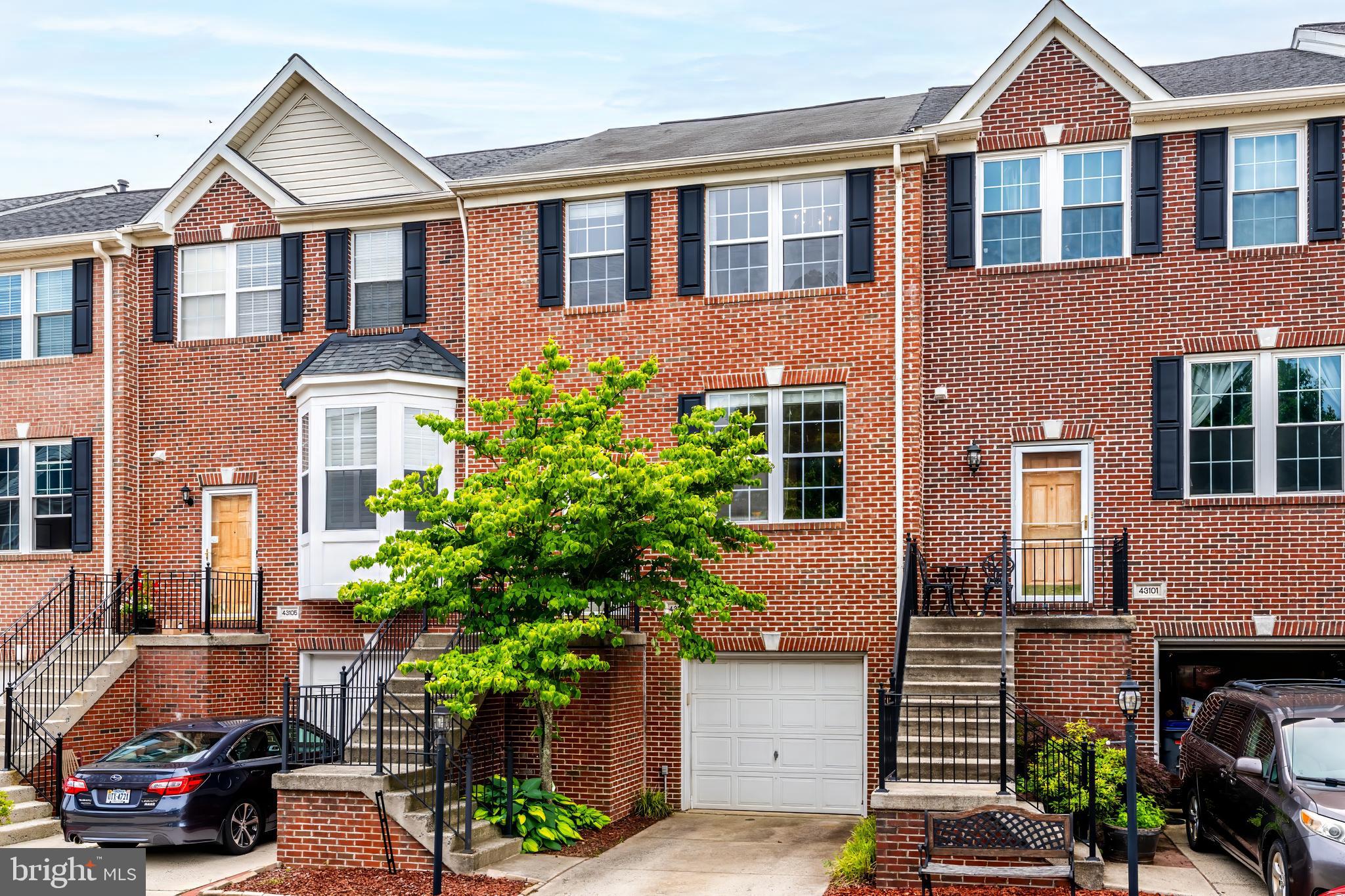 43103 Forest Edge Square Broadlands, VA 20148 - Photo 3 of 57 a front view of a house with plants