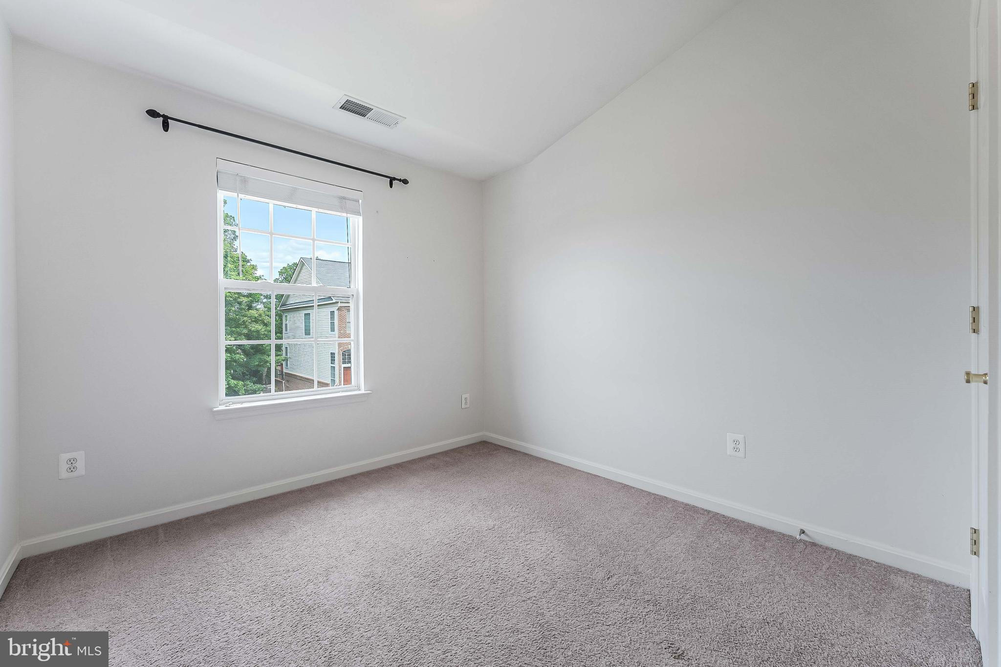 43103 Forest Edge Square Broadlands, VA 20148 - Photo 43 of 57 an empty room with a window