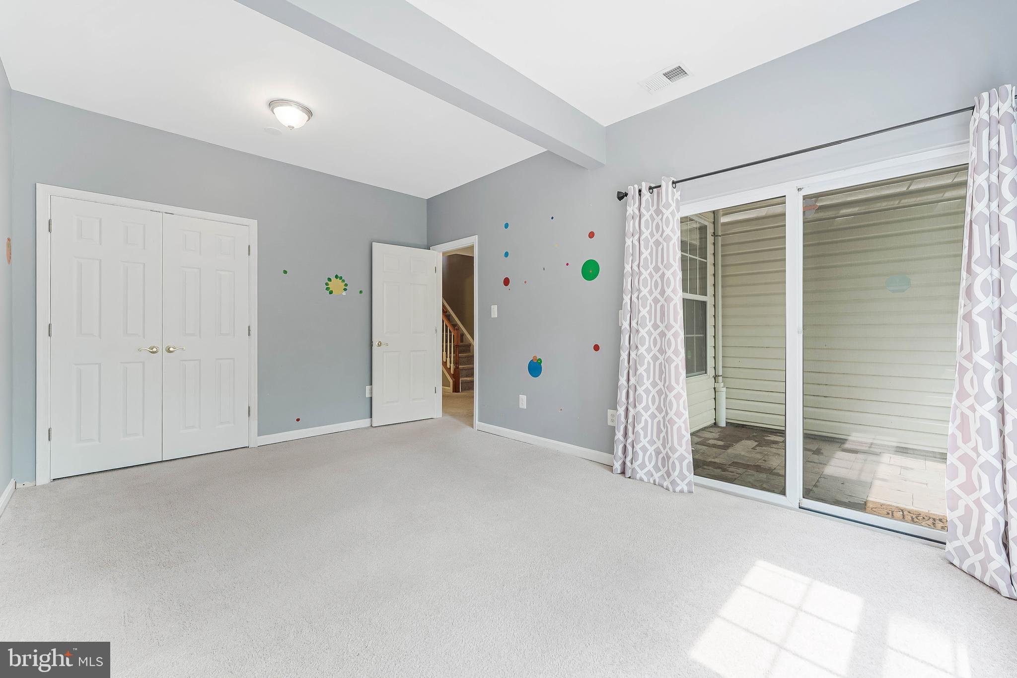 43103 Forest Edge Square Broadlands, VA 20148 - Photo 46 of 57 a view of empty room with floor to ceiling window