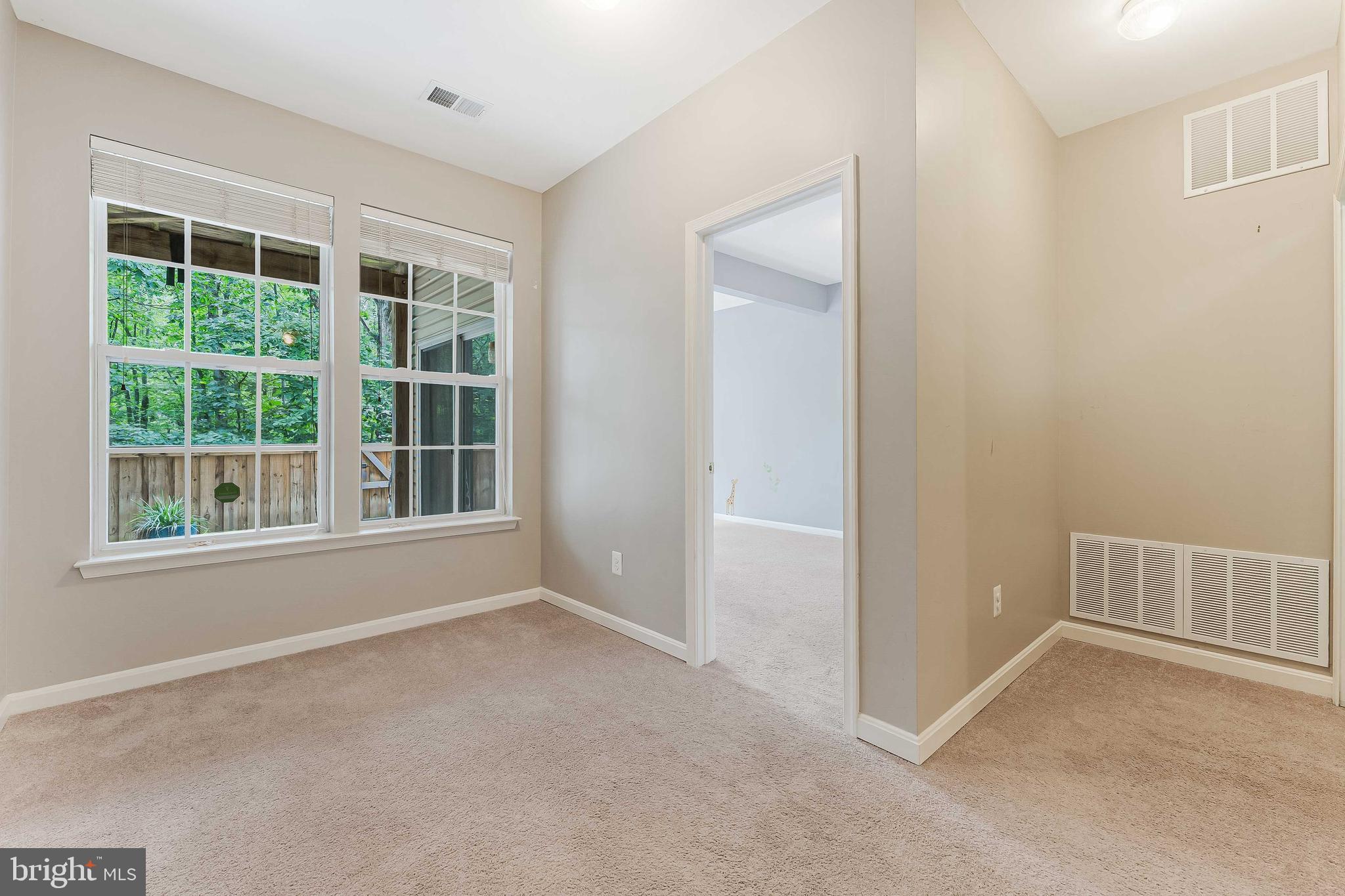 43103 Forest Edge Square Broadlands, VA 20148 - Photo 49 of 57 an empty room with windows