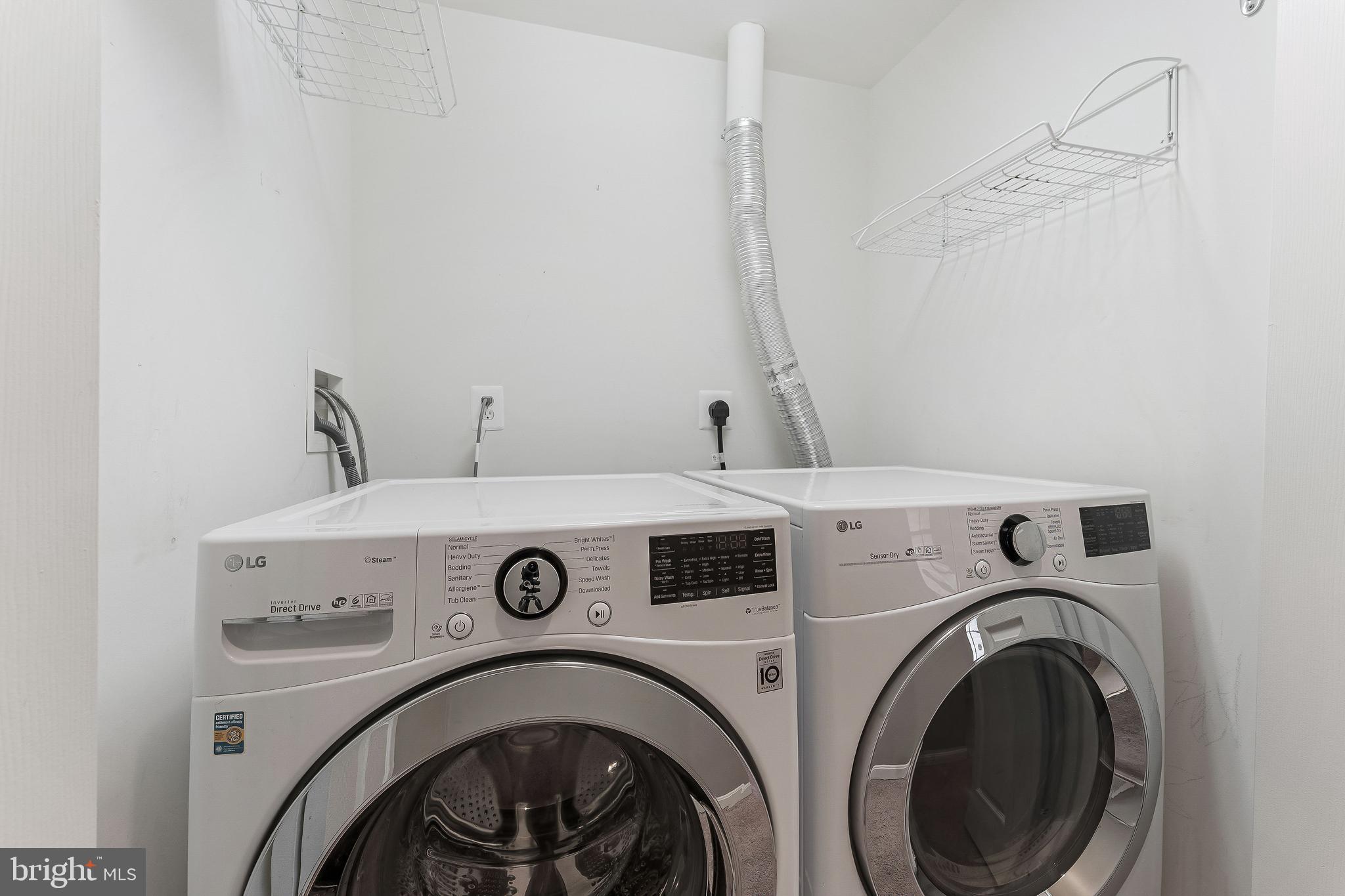 43103 Forest Edge Square Broadlands, VA 20148 - Photo 50 of 57 a utility room with dryer and washer