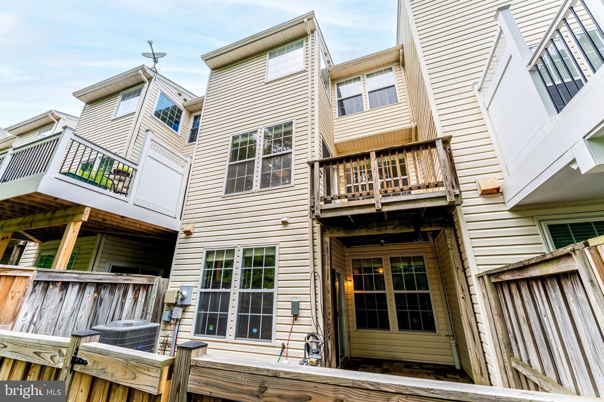 43103 Forest Edge Square Broadlands, VA 20148 - Photo 53 of 57 a view of a house with a window and wooden floor