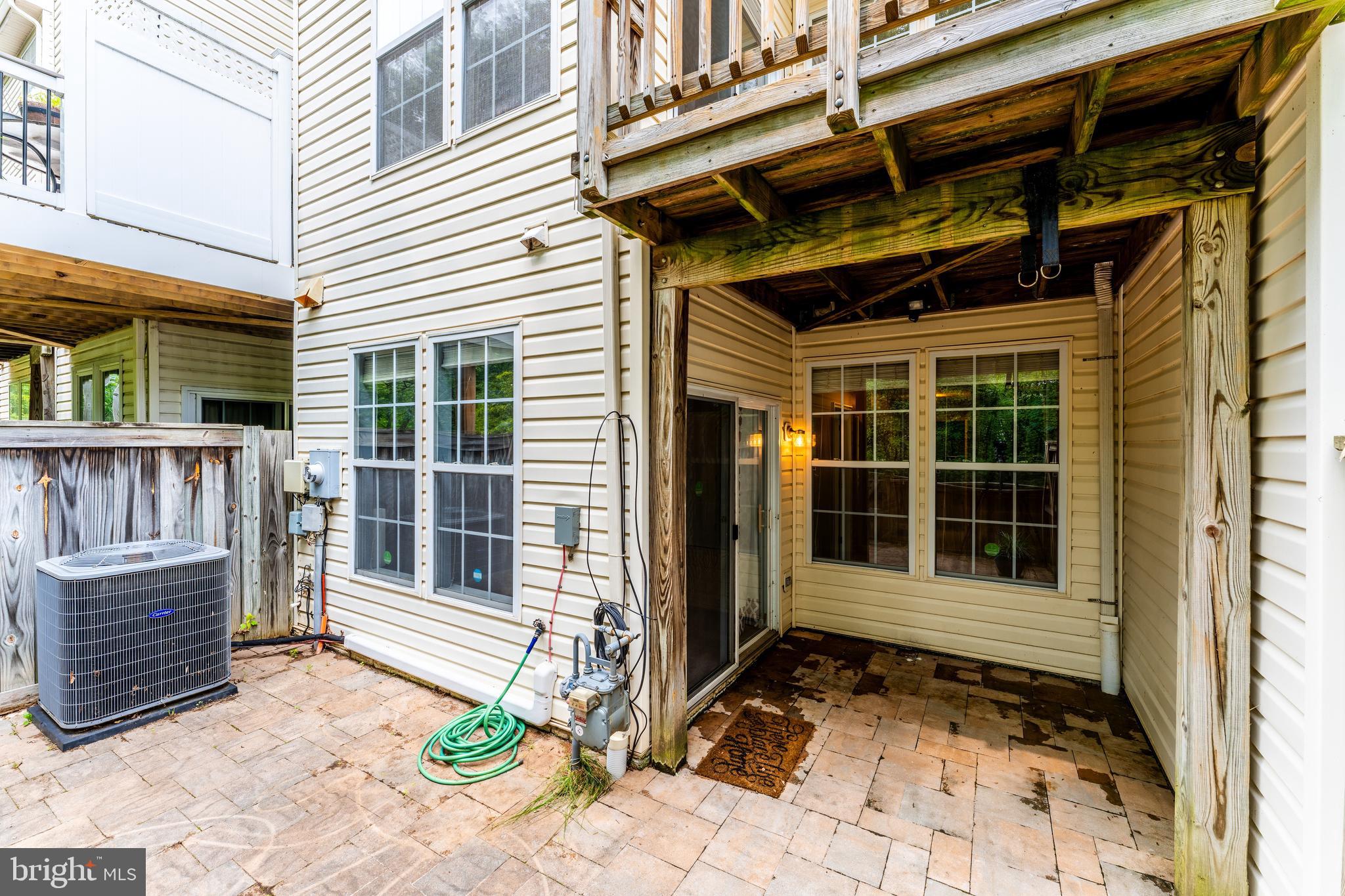 43103 Forest Edge Square Broadlands, VA 20148 - Photo 57 of 57 a view of a house with a window and wooden fence
