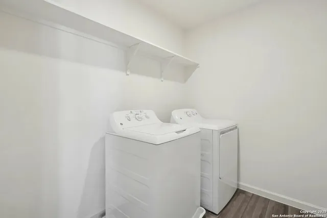 a utility room with dryer and washer