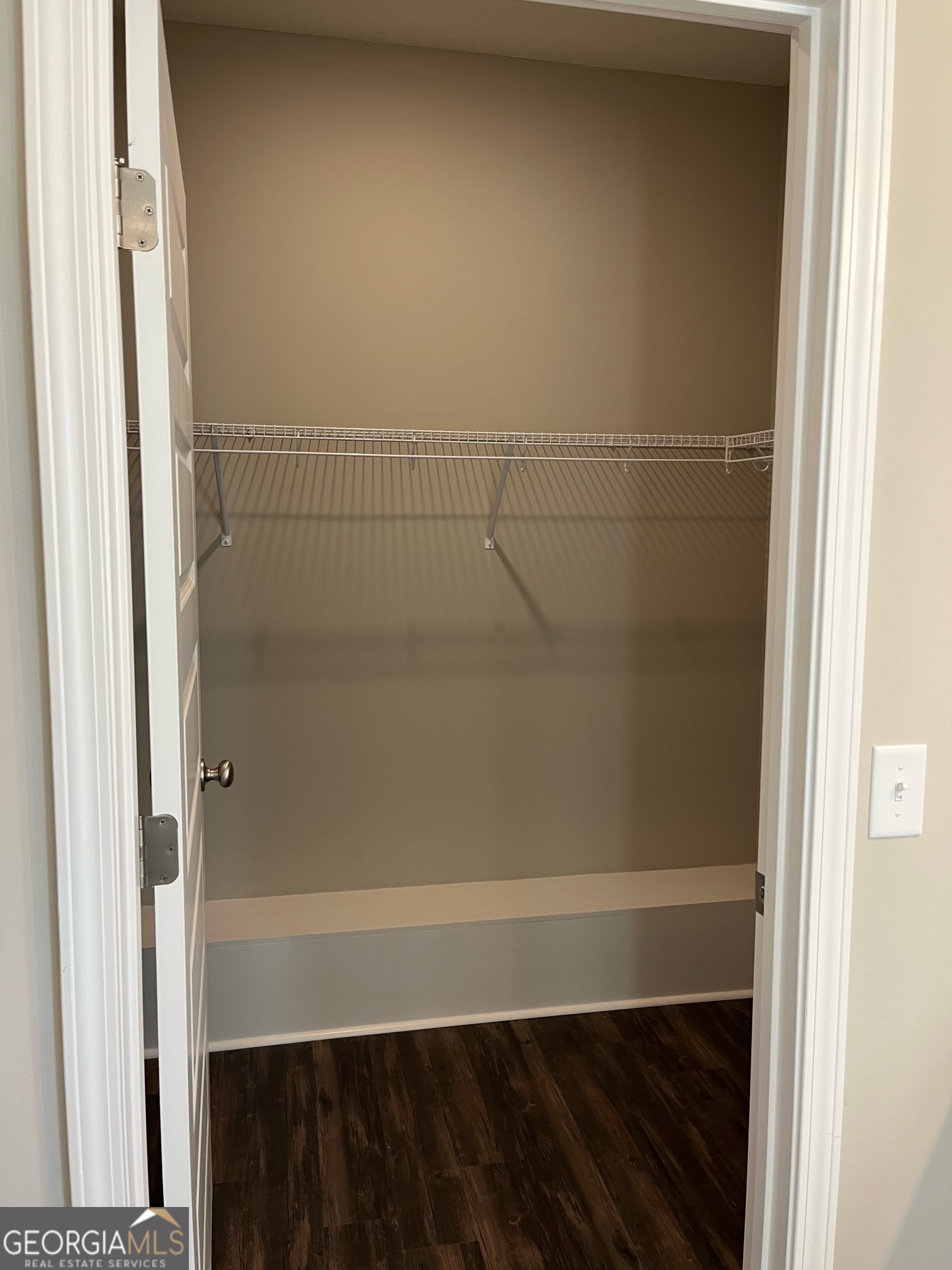 129 Orchard Way Brooklet, GA 30415 - Photo 11 of 15 a view of small space with racks on the wall