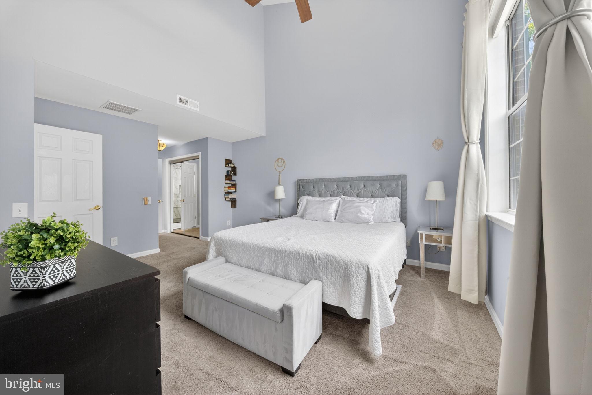 6006 Lincolnia Road Alexandria, VA 22312 - Photo 24 of 42 Serene bedroom with soft blue hues.