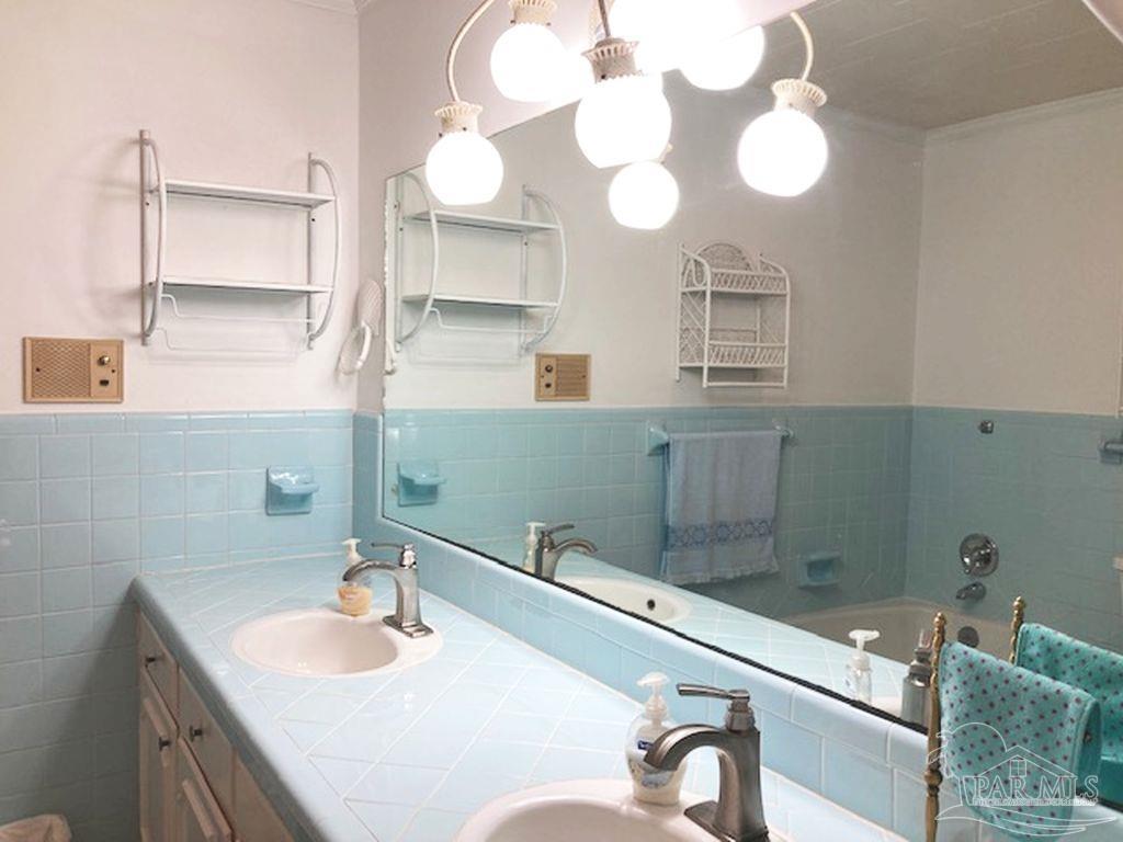 9870 Highway 31 Atmore, AL 36502 - Photo 21 of 31 a bathroom with a sink and a mirror