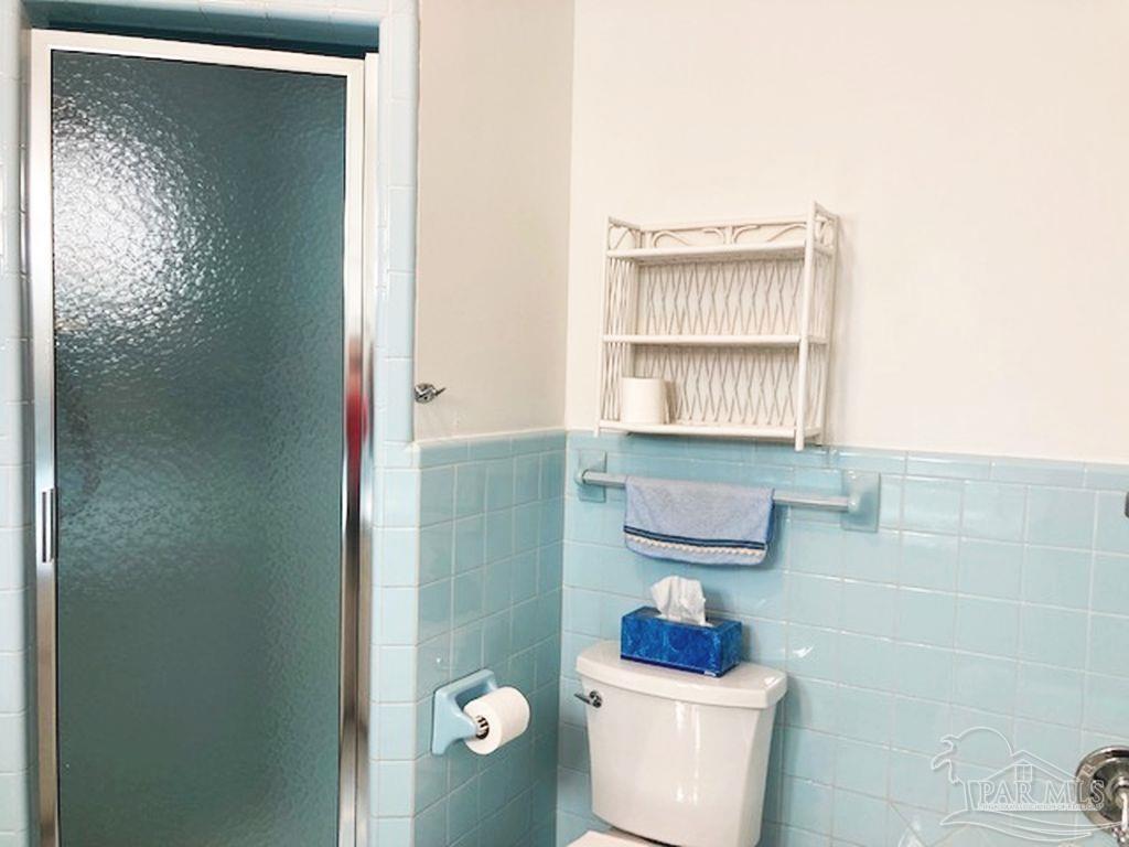 9870 Highway 31 Atmore, AL 36502 - Photo 22 of 31 a bathroom with a toilet and a sink