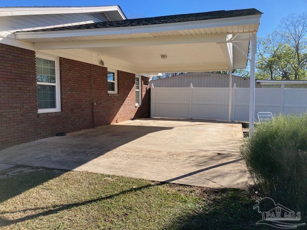 9870 Highway 31 Atmore, AL 36502 - Photo 27 of 31 a view of backyard with small cabin