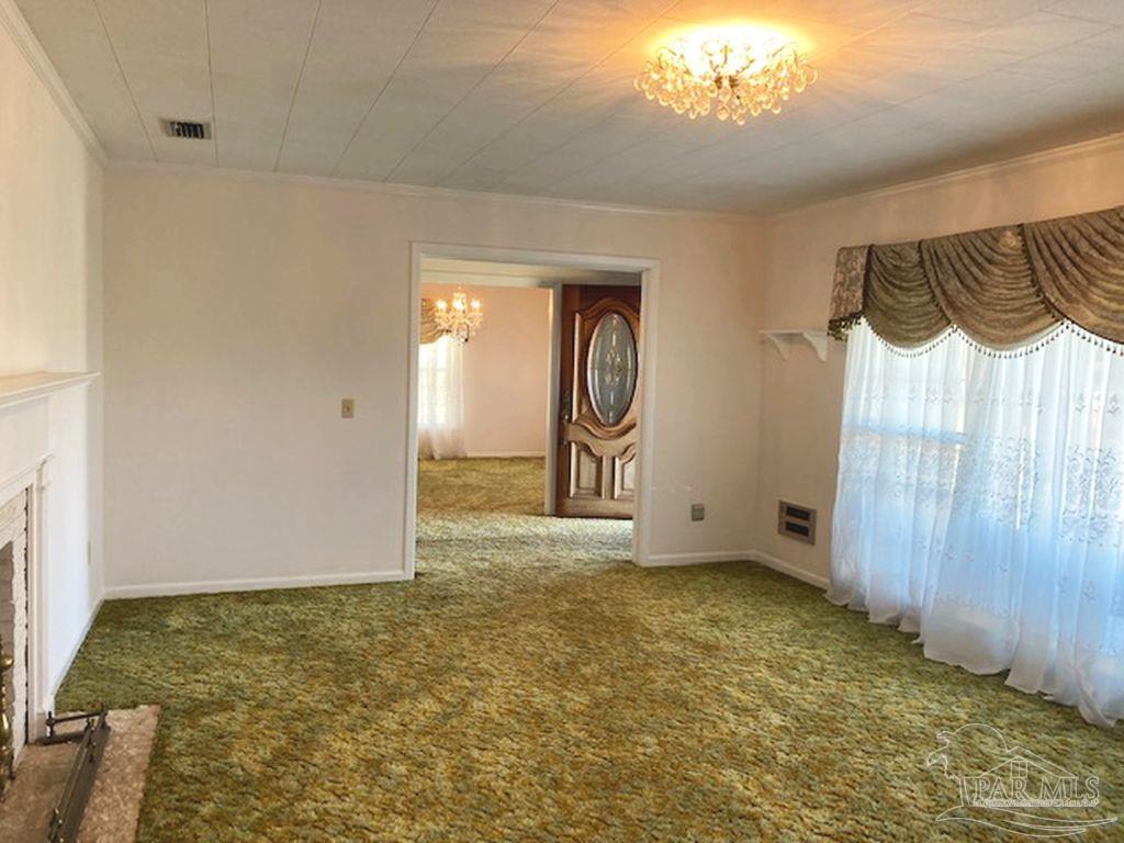 9870 Highway 31 Atmore, AL 36502 - Photo 4 of 31 a view of an empty room and window